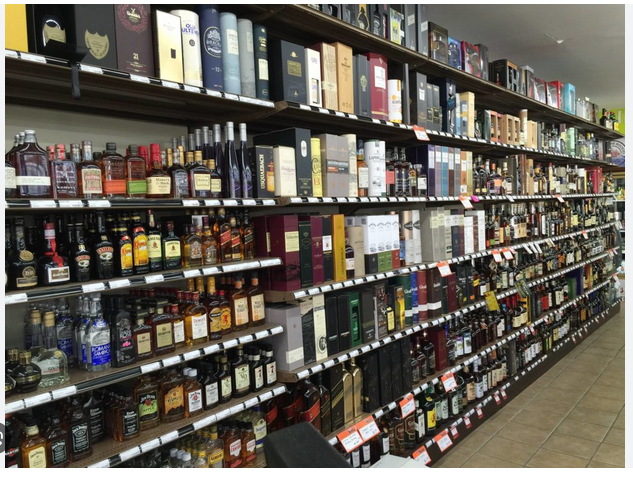 Row of wines and whiskeys in the liquor store